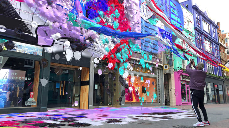 A person walking down the street
Description automatically generated